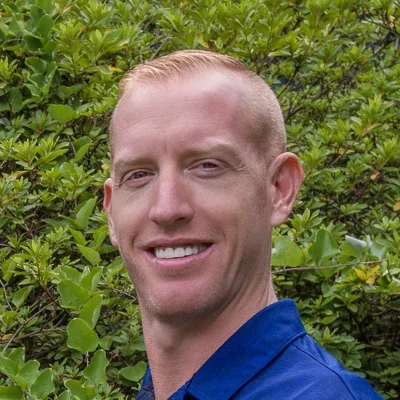 Chiropractor Brendal Epling Smiling Warmly at the Viewer